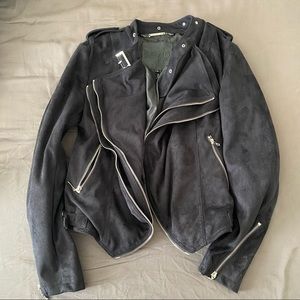 Black belt and zippered jacket